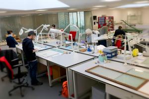 Staff and volunteers working in the Conservation Unit at PRONI