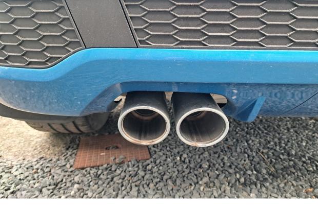 Photograph of clean twin exhausts on a car